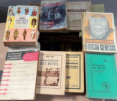 several books are stacked on top of each other on a table