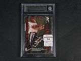 a close up of a baseball card on a black surface