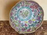 a colorful bowl sitting on top of a marble counter