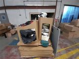 a pile of boxes that are sitting on the floor