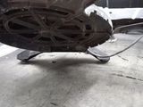 a close up of a car ' s front wheel and tire