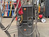a machine that is sitting on a cart in the garage