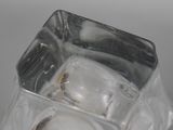 an ice cube with a ring in it on a table