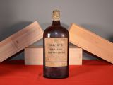a bottle of wine that is sitting on a table