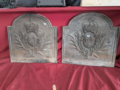 pair of antique cast iron fireplace screens with crown and shield