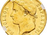 Gros plan sur une pièce d'or ornée d'une tête de femme
