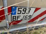 a close up of a license plate on a vehicle