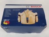 une boîte de plaquettes de frein Bosch posée sur une surface blanche
