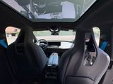 a view of the inside of a car from the driver ' s seat