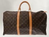 Sac Keepall Louis Vuitton en toile Monogram et cuir