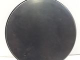 an image of a black plate on a white surface