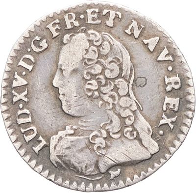 gros plan d'une pièce de monnaie sur fond blanc