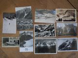 many old photographs on the floor of this room