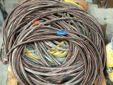 a large pile of wires on a pallet outside