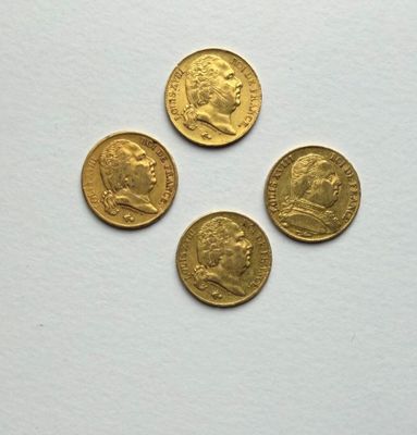 three gold coins with a picture of a man and a woman on them