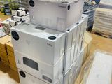 several boxes stacked on top of each other in a warehouse