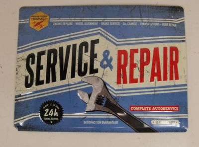a picture of a service and repair sign on a wall
