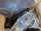 a cardboard box with a bunch of items inside of it