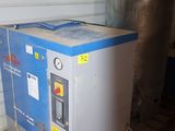 a machine that is sitting on a pallet in a garage