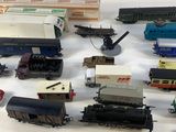 many different types of toy trains on a table