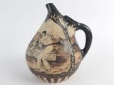 un vase avec une peinture sur fond blanc