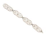 a close up of a bracelet on a white background