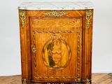 an image of a wooden cabinet with a marble top on a parquet floor