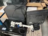 a lot of computer equipment sitting on top of a table