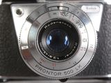 a close up of a camera with a lens on it