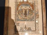 une reproduction encadrée d'un tableau exposé dans un musée