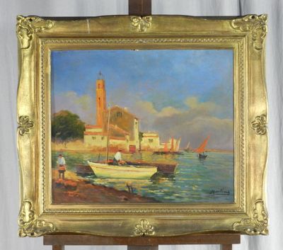 une photo d'un tableau posé sur un chevalet au bord de l'eau