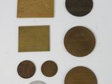 a lot of coins that are sitting on a table