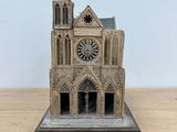 an image of a model of a church on a wooden table