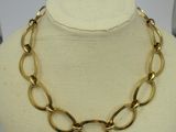 a close up of a necklace on a mannequin mannequin