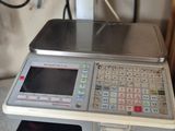 a cash register sitting on top of a counter