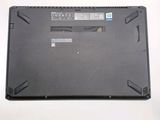 the back of a laptop with a small battery on top of it