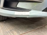 a close up of a car ' s bumper with a sticker on it