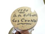 a bottle of wine with a cork stopper on it