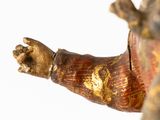a statue of a man with his hands out
