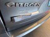 a close up of a car with a sticker on the back of it