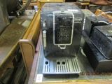 an image of a coffee machine sitting on a table