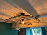 a light that is hanging from the ceiling in a room