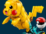 lego pikachu and poke pikachu on a skateboard