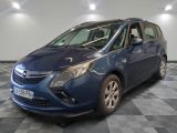 a picture of a blue opel parked in a garage
