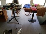 an image of a cluttered living room with a laptop and other items