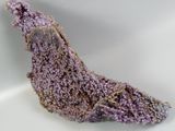 a piece of amethorate on a white surface