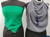 a picture of two women ' s scarves with monograms on them
