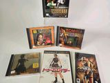 quatre DVD posés sur une surface blanche