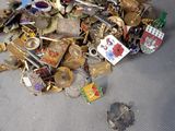 a pile of assorted metal items on a table