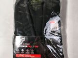 two pairs of black socks in a plastic bag